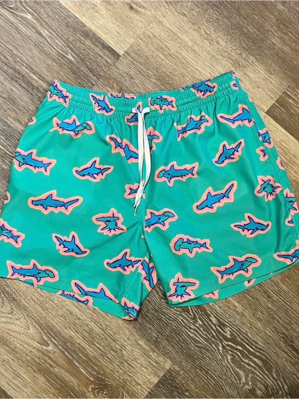 chubbies Teal Swim Trunks with Pink & Blue Shark Outline Print